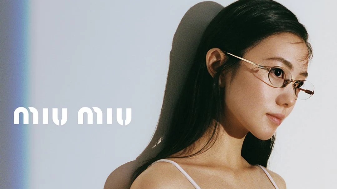 Woman wearing Miu Miu prescription glasses